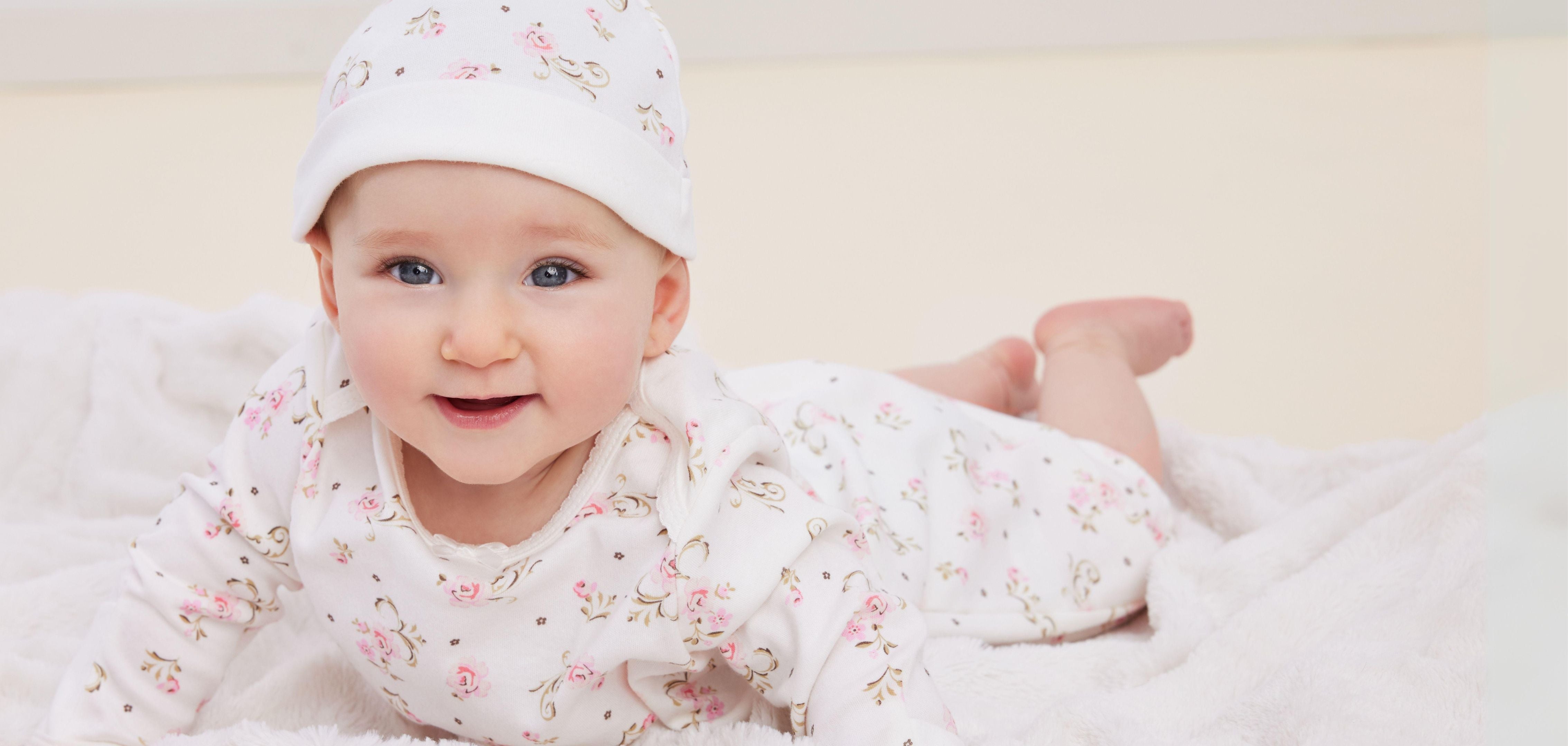 Little Me newborn baby girl in soft cotton sleeper gown — newborn essentials collection